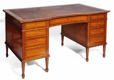 Lot 40 - A LATE 19TH CENTURY SATINWOOD VENEERED WRITING DESK having a leather tooled top and concave front