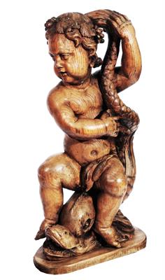 Lot 48 - AN ANTIQUE CENTURY CARVED WOODEN FIGURE of a cherub with a sea creature