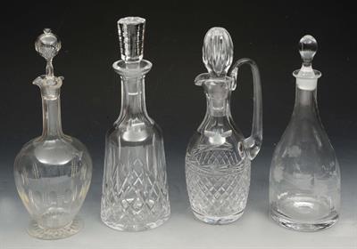 Lot 59 - A CUT GLASS CLARET JUG AND STOPPER with star base