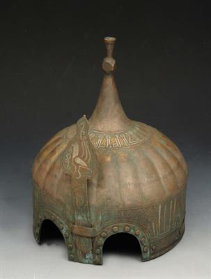 Lot 62 - A PERSIAN COPPER AND BRASS HELMET of lobed design