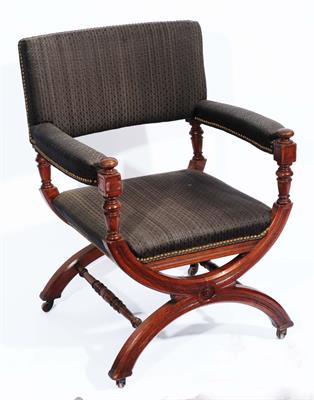 Lot 78 - A LATE VICTORIAN OAK FRAMED ELBOW CHAIR with inverted hoop supports and ring turned stretchers