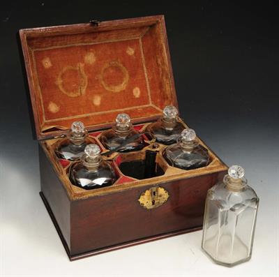 Lot 83 - AN 18TH CENTURY MAHOGANY VELVET LINED DECANTER BOX with brass carrying handle and fitted six contemp
