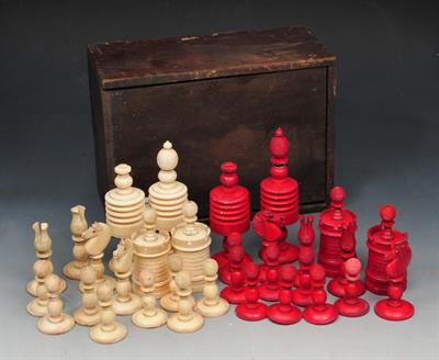 Lot 99 - A VICTORIAN CARVED IVORY CHESS SET of turned form in wooden box