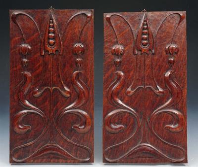 Lot 114 - A PAIR OF ART NOUVEAU CARVED OAK PANELS with stylised scrolling foliate motif