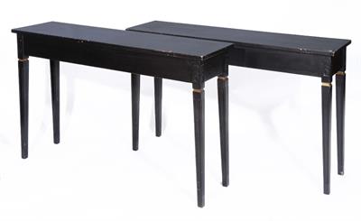 Lot 119 - A PAIR OF BLACK PAINTED RECTANGULAR PIER TABLES on fluted tapering legs with carved foliate ornament