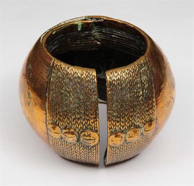 Lot 126 - A WEST AFRICAN BRASS SLEEVE BRACELET