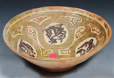 Lot 151 - AN EARLY ISLAMIC GLAZED TERRACOTTA BOWL