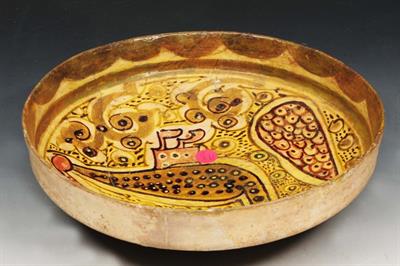 Lot 153 - AN ISLAMIC GLAZED POTTERY SHALLOW BOWL