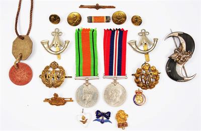 Lot 209 - A SMALL COLLECTION OF MILITARY BADGES