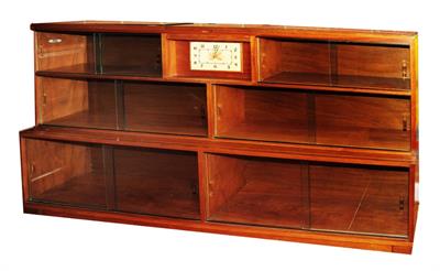 Lot 224 - A 20TH CENTURY MINTY SECTIONAL BOOKCASE with various glazed shelves around a central clock labelled