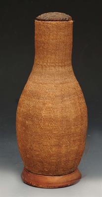 Lot 241 - A SOMALI AFRICAN WOVEN BASKET AND LID