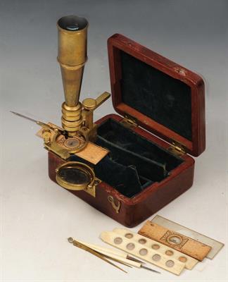 Lot 270 - AN EARLY 19TH CENTURY BRASS POCKET MICROSCOPE by Cary of London in original mahogany box with two sl