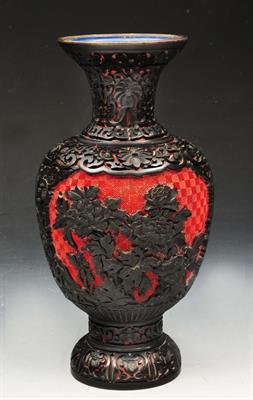 Lot 286 - A CHINESE CINNABAR LACQUER BALUSTER VASE with intricate carved decoration