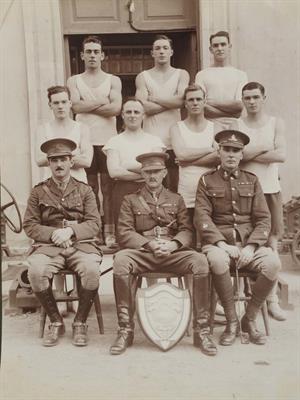 Lot 591 - A WWII PERIOD AND LATER SCRAP ALBUM containing military interest photographs