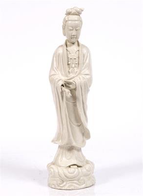 Lot 33 - A large Chinese Dehua standing figure of Guanyin