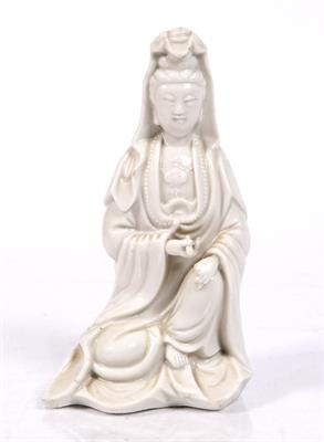 Lot 37 - A Chinese Dehua figure of a seated Guanyin