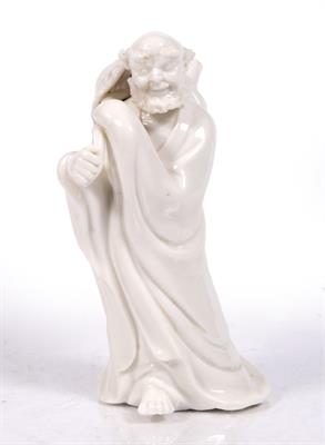 Lot 44 - A Chinese Dehua figure of a Lohan