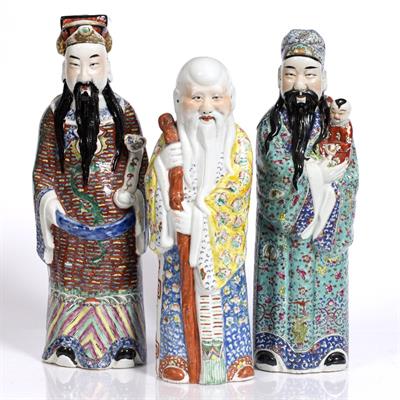 Lot 50 - Three Chinese polychrome figures of Immortals