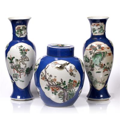 Lot 69 - A garniture of three Chinese famille rose vases