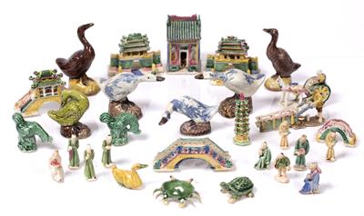 Lot 111 - A collection of Chinese miniature pottery pieces