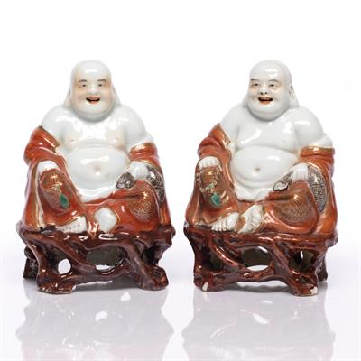 Lot 115 - A pair of Chinese seated model Pu-Tai