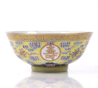 Lot 125 - A Chinese yellow enamel longevity bowl