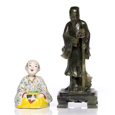 Lot 133 - A Chinese biscuit porcelain nodding boy