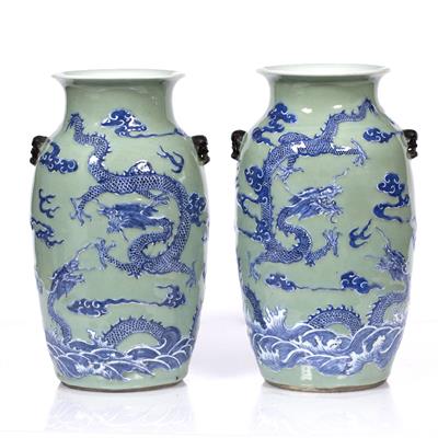 Lot 145 - A pair of Chinese celadon vases