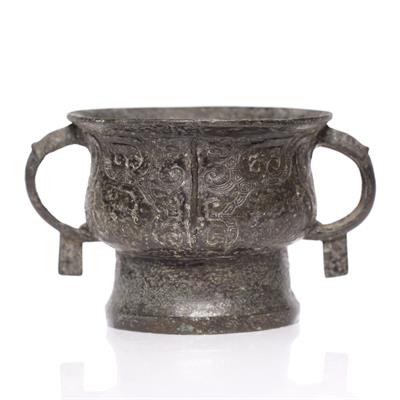 Lot 180 - A Chinese bronze archaic two handled censer