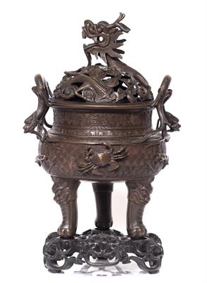 Lot 181 - A Chinese archaic form bronze censer and cover