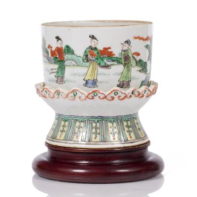 Lot 188 - A Chinese polychrome candle holder