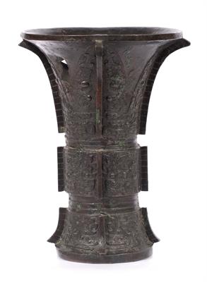 Lot 194 - A Chinese archaic gu shaped vase