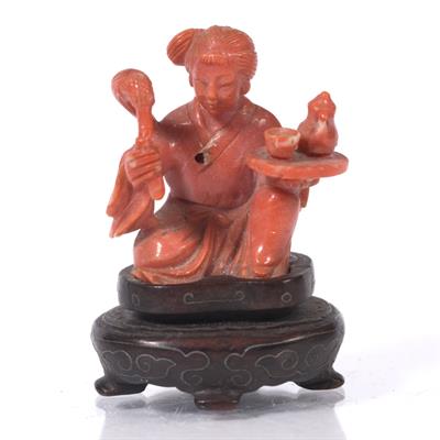 Lot 206 - A Chinese coral miniature carving of a court lady