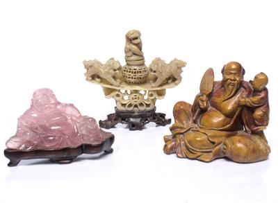 Lot 207 - A Chinese rose quartz figure of Putai