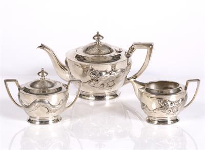 Lot 214 - A Chinese white metal three piece teaset