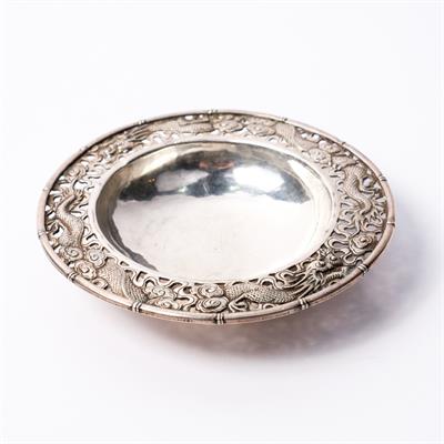 Lot 238 - A Chinese white metal dish