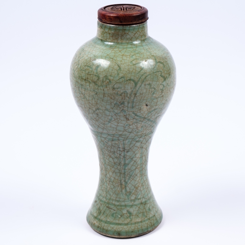 Lot 301 - A Chinese celadon vase