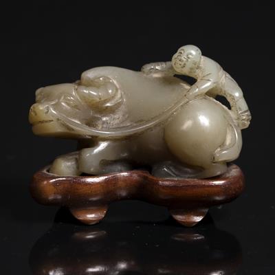 Lot 327 - A Chinese jade carving of a reclining buffalo