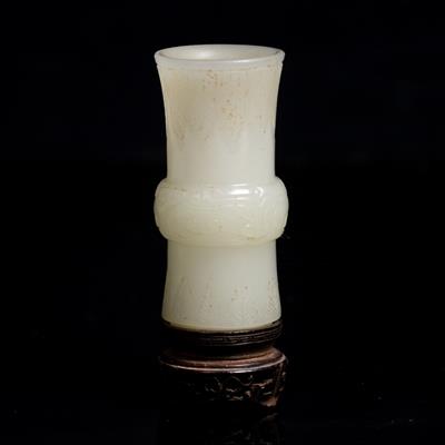 Lot 334 - A Chinese jade miniature vase