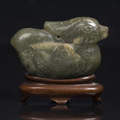 Lot 337 - A Chinese green jade carving of a Mandarin duck