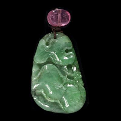 Lot 342 - A Chinese carved jade pendant