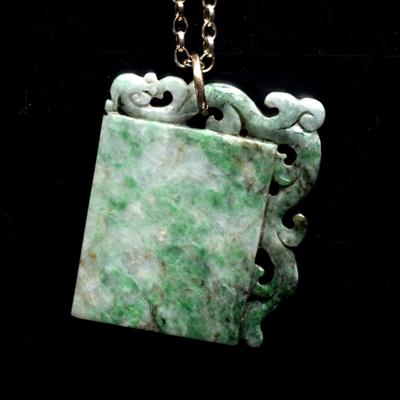 Lot 347 - A Chinese jade pendant