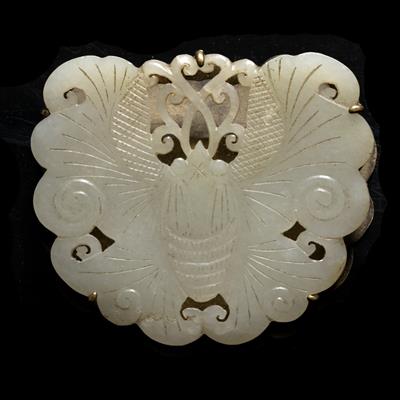 Lot 350 - A Chinese greyish white jade pendant