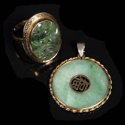 Lot 353 - A Chinese jade annular pendant