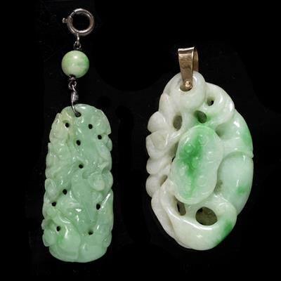 Lot 360 - A Chinese white and emerald green jadeite pendant