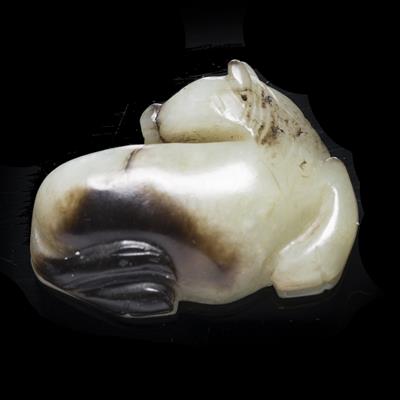 Lot 363 - A Chinese Ming style black and white jade pebble