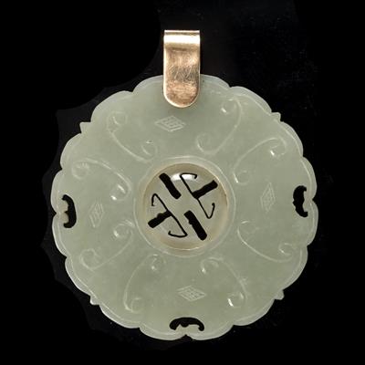 Lot 370 - A Chinese green jade medallion shaped pendant