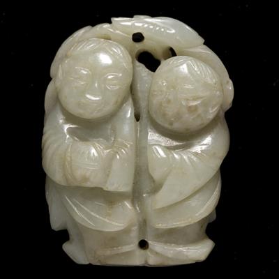 Lot 373 - A Chinese white jade pebble