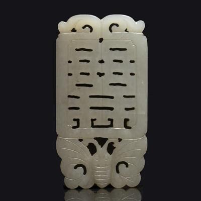 Lot 378 - A Chinese pale green jade pendant