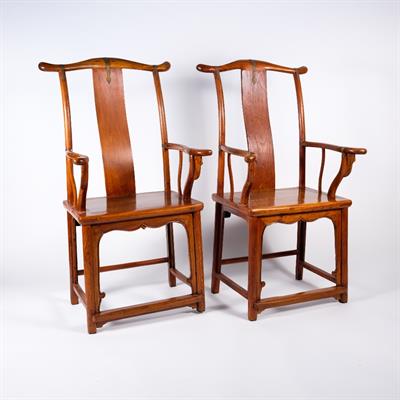 Lot 398 - A pair of Chinese Ming style elm chairs